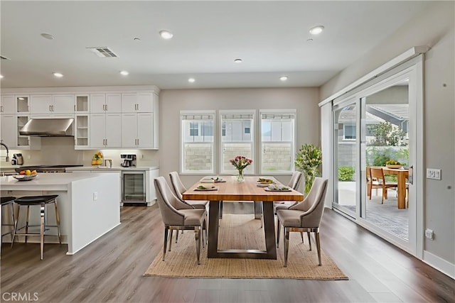 54 Sagan Way, Irvine, CA 92618 - dining room featuring wine cooler, light wood-type flooring, and recessed lighting