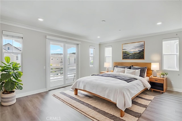54 Sagan Way, Irvine, CA 92618 - bedroom with access to exterior, ornamental molding, light wood-type flooring, and recessed lighting