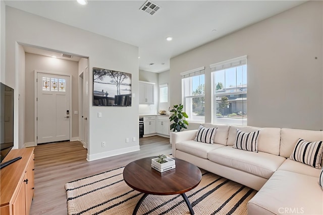 54 Sagan Way, Irvine, CA 92618 - living area featuring light wood-style floors and recessed lighting