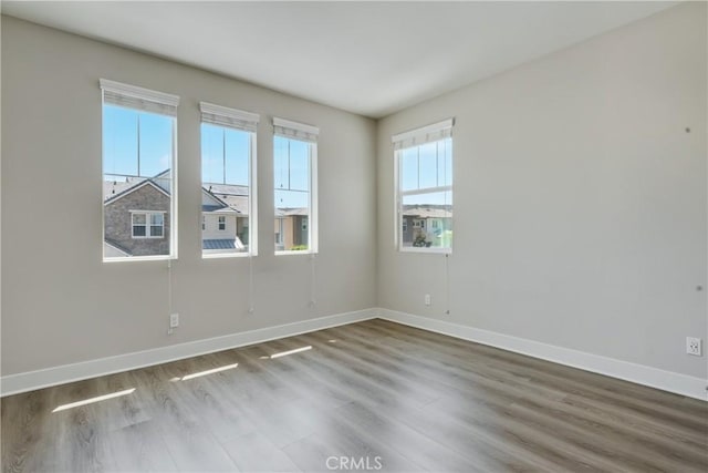 54 Sagan Way, Irvine, CA 92618 - spare room with wood finished floors and baseboards