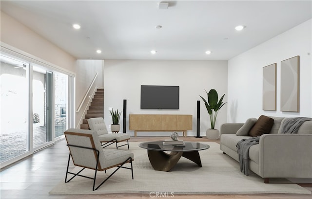 54 Sagan Way, Irvine, CA 92618 - living area featuring wood finished floors, recessed lighting, and stairway