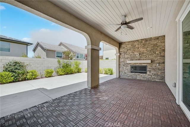 54 Sagan Way, Irvine, CA 92618 - view of patio with a fireplace and ceiling fan