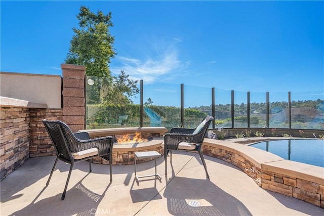 25 Thalia St, Ladera Ranch, CA 92694 - view of patio featuring a fire pit