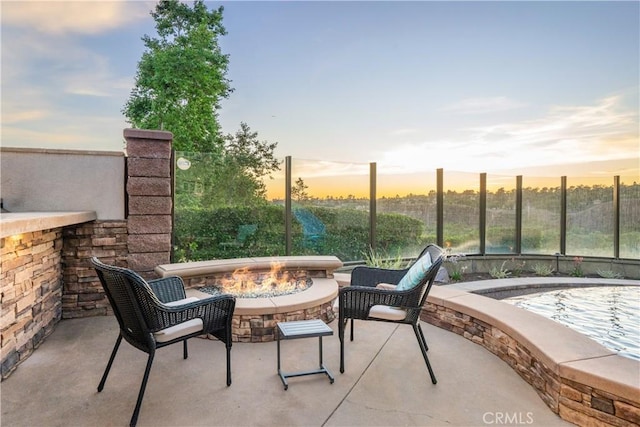 25 Thalia St, Ladera Ranch, CA 92694 - patio terrace at dusk with a fire pit and a patio area
