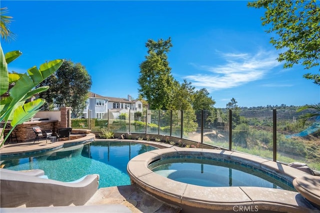 25 Thalia St, Ladera Ranch, CA 92694 - outdoor pool with an in-ground hot tub