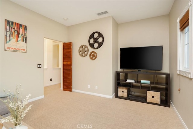 25 Thalia St, Ladera Ranch, CA 92694 - carpeted living room featuring baseboards