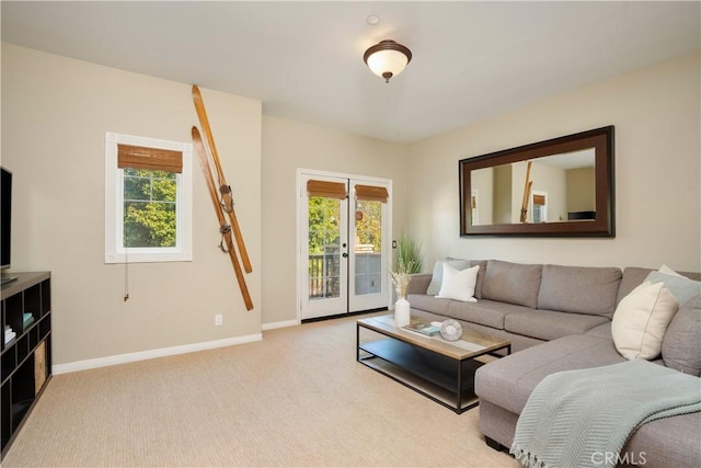 25 Thalia St, Ladera Ranch, CA 92694 - carpeted living room featuring healthy amount of natural light and french doors