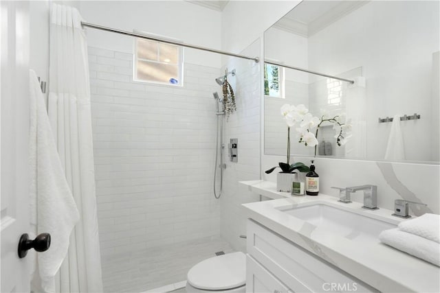 25 Thalia St, Ladera Ranch, CA 92694 - bathroom featuring ornamental molding, vanity, a tile shower, and healthy amount of natural light