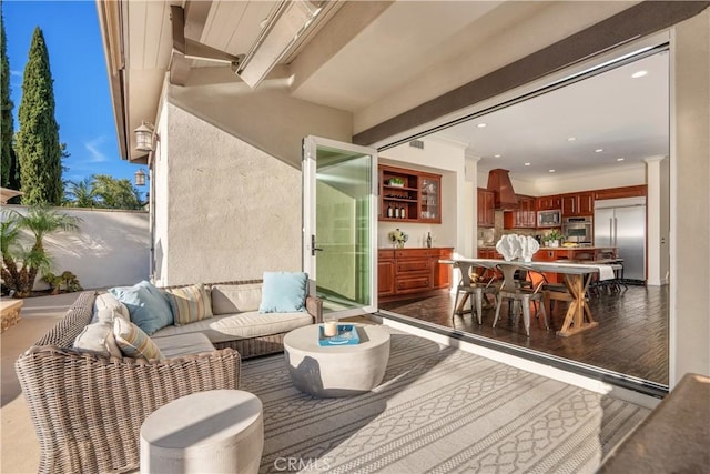 25 Thalia St, Ladera Ranch, CA 92694 - living room featuring dark wood-style floors and recessed lighting