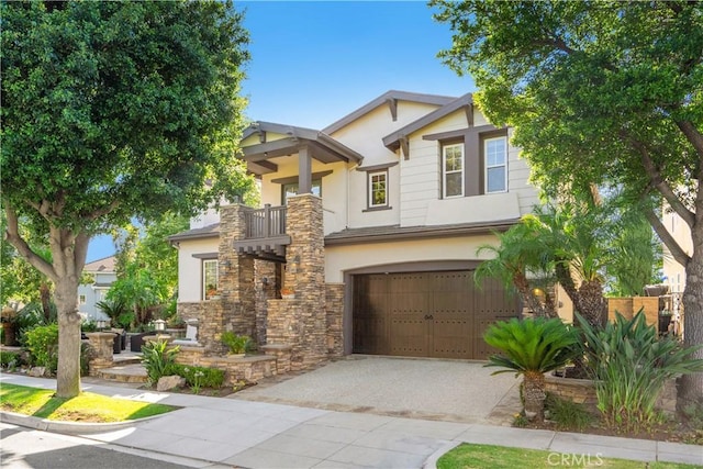 25 Thalia St, Ladera Ranch, CA 92694 - craftsman house featuring stucco siding, concrete driveway, stone siding, and a garage