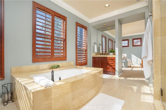 25 Thalia St, Ladera Ranch, CA 92694 - bathroom featuring vanity, crown molding, a bath, and recessed lighting