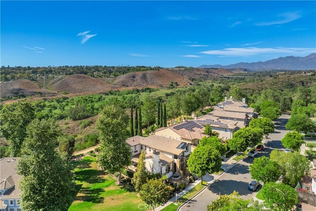 25 Thalia St, Ladera Ranch, CA 92694 - aerial view of property's location featuring a mountain backdrop and nearby suburban area