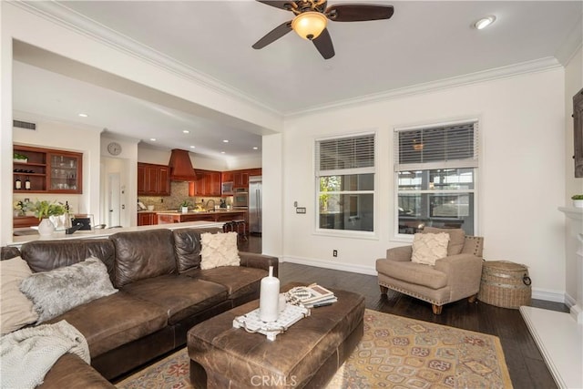25 Thalia St, Ladera Ranch, CA 92694 - living area with ceiling fan, dark wood finished floors, crown molding, and recessed lighting