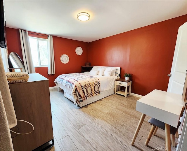 65076 E Broadway, Joshua Tree, CA 92252 - bedroom featuring light wood-style floors