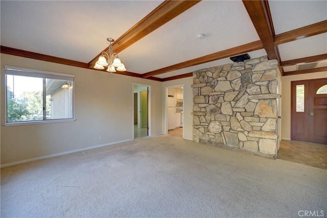 6305 Portola Rd, Atascadero, CA 93422 - unfurnished living room with beamed ceiling, healthy amount of natural light, carpet floors, and a chandelier