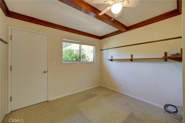 6305 Portola Rd, Atascadero, CA 93422 - carpeted empty room with a ceiling fan, beamed ceiling, and ornamental molding
