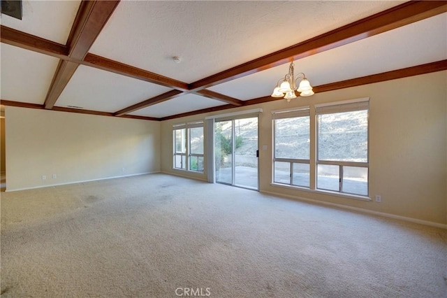 6305 Portola Rd, Atascadero, CA 93422 - unfurnished living room with beamed ceiling, a chandelier, carpet floors, and coffered ceiling