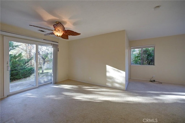 6305 Portola Rd, Atascadero, CA 93422 - carpeted empty room with healthy amount of natural light, ceiling fan, and a smoke detector