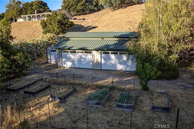 6305 Portola Rd, Atascadero, CA 93422 - detached garage featuring a vegetable garden