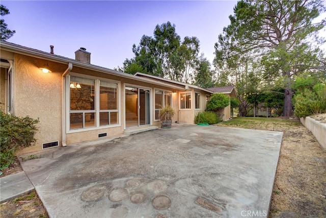 6305 Portola Rd, Atascadero, CA 93422 - back of property featuring a patio, a chimney, stucco siding, and crawl space