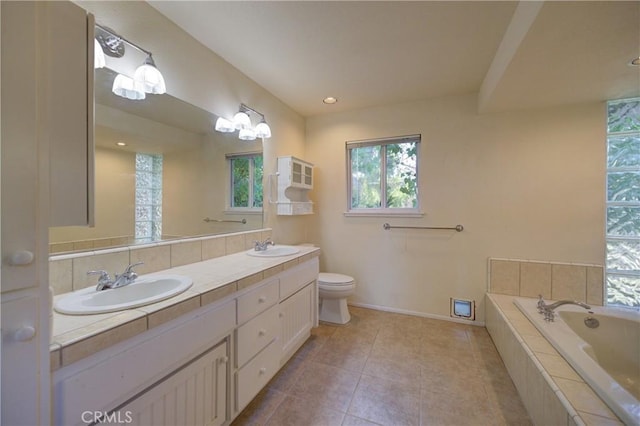 6305 Portola Rd, Atascadero, CA 93422 - bathroom featuring plenty of natural light, double vanity, a garden tub, tile patterned floors, and recessed lighting