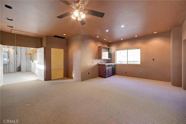 6305 Portola Rd, Atascadero, CA 93422 - unfurnished living room with light carpet, ceiling fan, and recessed lighting