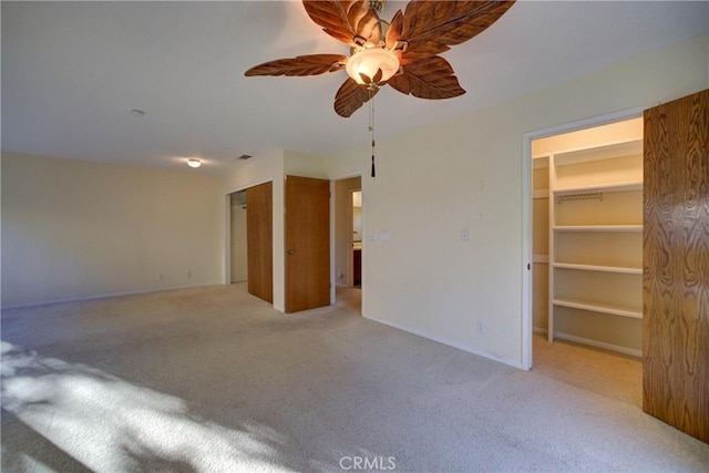 6305 Portola Rd, Atascadero, CA 93422 - unfurnished bedroom featuring carpet floors, a spacious closet, and ceiling fan