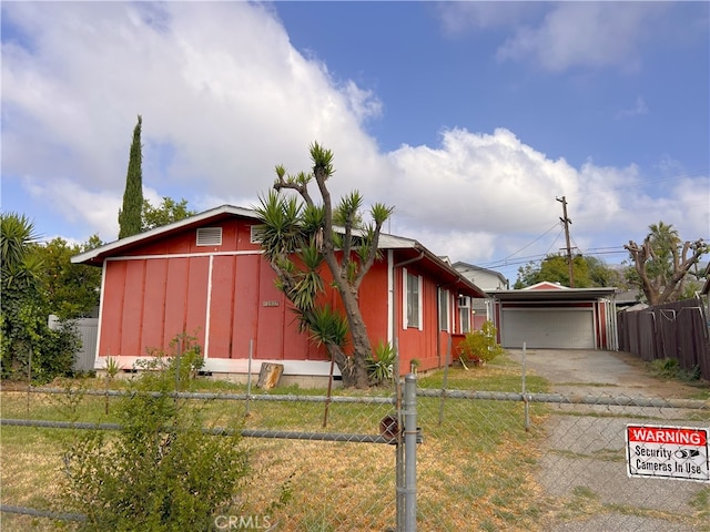13507 Raven St, Sylmar, CA 91342 - view of front of house featuring an outbuilding and a garage