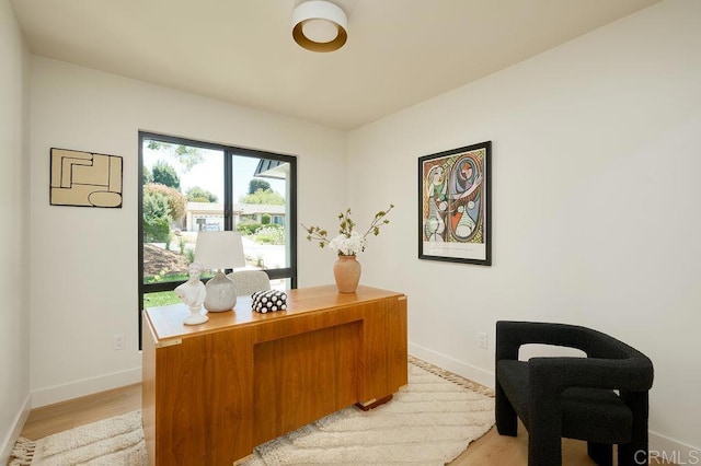 2025 Valley Rd, Oceanside, CA 92056 - home office featuring baseboards and light wood-type flooring