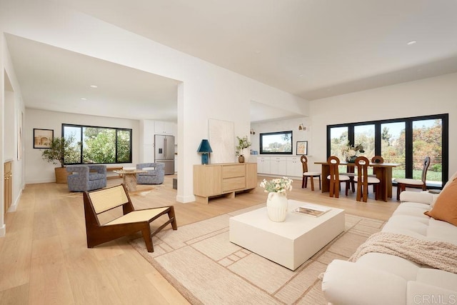 2025 Valley Rd, Oceanside, CA 92056 - living room with light wood finished floors and baseboards