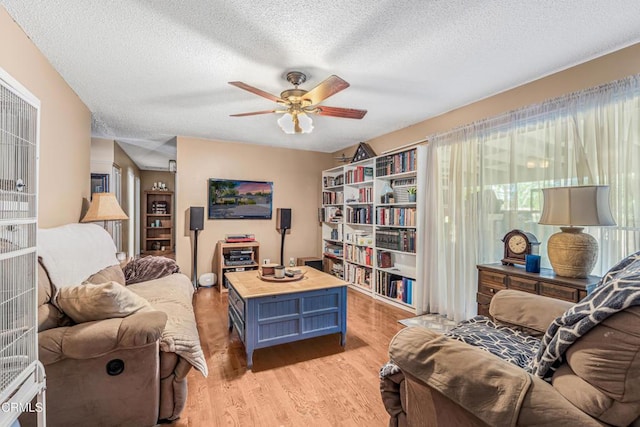 1373 Calle Crisantemo, Thousand Oaks, CA 91360 - living area with ceiling fan, a textured ceiling, and light wood-type flooring