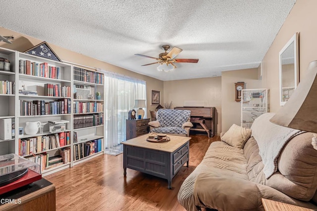 1373 Calle Crisantemo, Thousand Oaks, CA 91360 - living area featuring ceiling fan, wood finished floors, and a textured ceiling