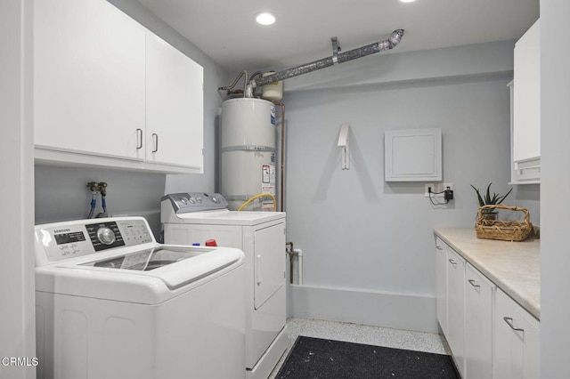 2142 Klamath Dr, Camarillo, CA 93010 - laundry room featuring secured water heater, cabinet space, washing machine and dryer, and recessed lighting