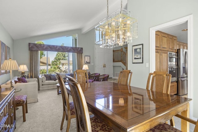 2142 Klamath Dr, Camarillo, CA 93010 - dining room featuring vaulted ceiling, light carpet, and a chandelier