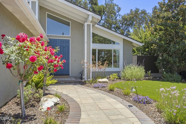 2142 Klamath Dr, Camarillo, CA 93010 - view of exterior entry with stucco siding and a yard