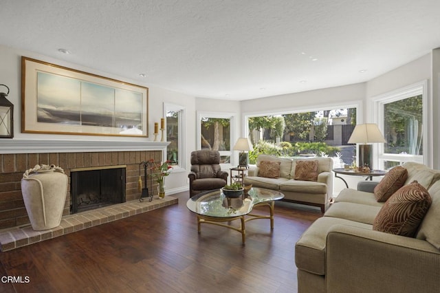 2142 Klamath Dr, Camarillo, CA 93010 - living room with a fireplace, wood finished floors, and a textured ceiling