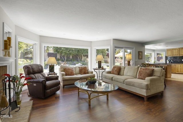 2142 Klamath Dr, Camarillo, CA 93010 - living area with dark wood-type flooring and a textured ceiling