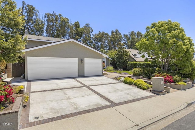 2142 Klamath Dr, Camarillo, CA 93010 - view of front of property featuring driveway, stucco siding, and an attached garage