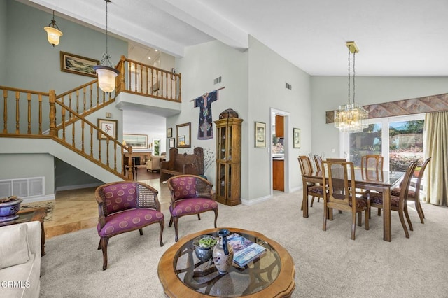 2142 Klamath Dr, Camarillo, CA 93010 - living room featuring carpet flooring, a chandelier, stairs, and high vaulted ceiling