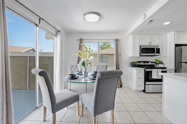 853 Dana Point Way, Oceanside, CA 92058 - dining space featuring light tile patterned floors and recessed lighting