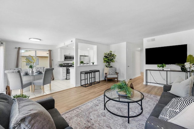 853 Dana Point Way, Oceanside, CA 92058 - living room featuring light wood-style floors