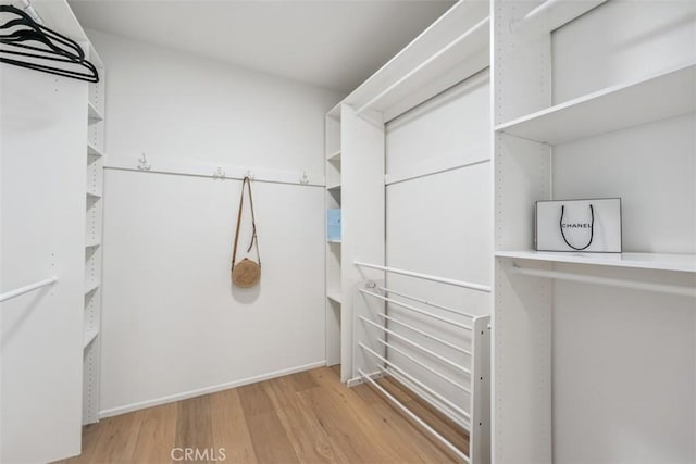 9 Phillips Cir, Laguna Niguel, CA 92677 - spacious closet with wood finished floors
