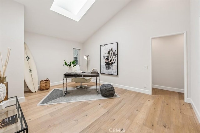 9 Phillips Cir, Laguna Niguel, CA 92677 - home office featuring a skylight, high vaulted ceiling, and light wood-type flooring