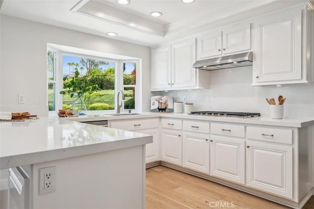 9 Phillips Cir, Laguna Niguel, CA 92677 - kitchen featuring under cabinet range hood, stainless steel gas cooktop, white cabinets, recessed lighting, and light countertops
