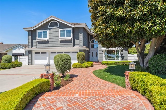 9 Phillips Cir, Laguna Niguel, CA 92677 - traditional home with an attached garage and concrete driveway