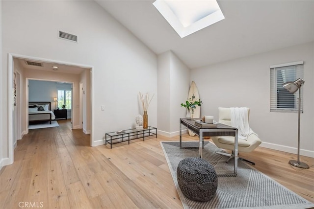 9 Phillips Cir, Laguna Niguel, CA 92677 - office area with a skylight, light wood-style floors, and high vaulted ceiling