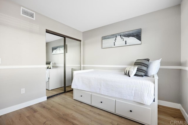 183 Mangano Cir, Encinitas, CA 92024 - bedroom featuring wood finished floors and a closet