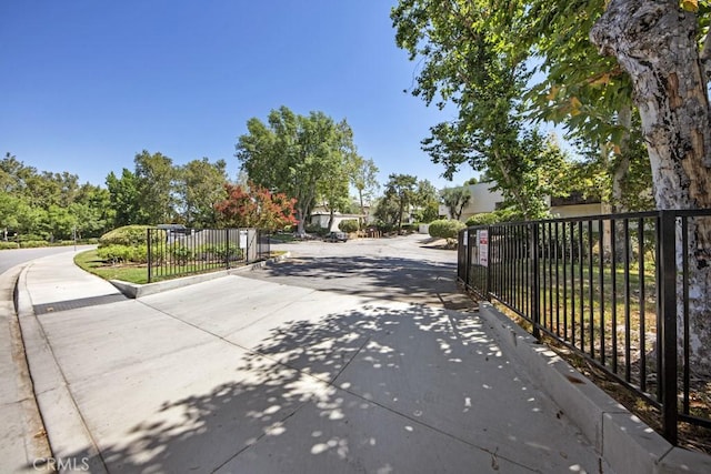 23515 Lyons Ave Unit 140, Valencia, CA 91355 - view of concrete driveway