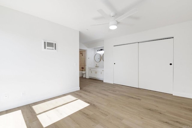 615 Fredricks Ave Unit 157, Oceanside, CA 92058 - unfurnished bedroom with light wood finished floors, a closet, ensuite bath, and ceiling fan