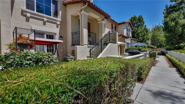 28653 Bar Hbr, Temecula, CA 92591 - view of home's exterior featuring stucco siding, a tile roof, and stairs